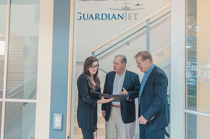 Guardian Jet's Managing Partners Don and Mike Dwyer discuss aircraft sales with market researcher Joan Dywer